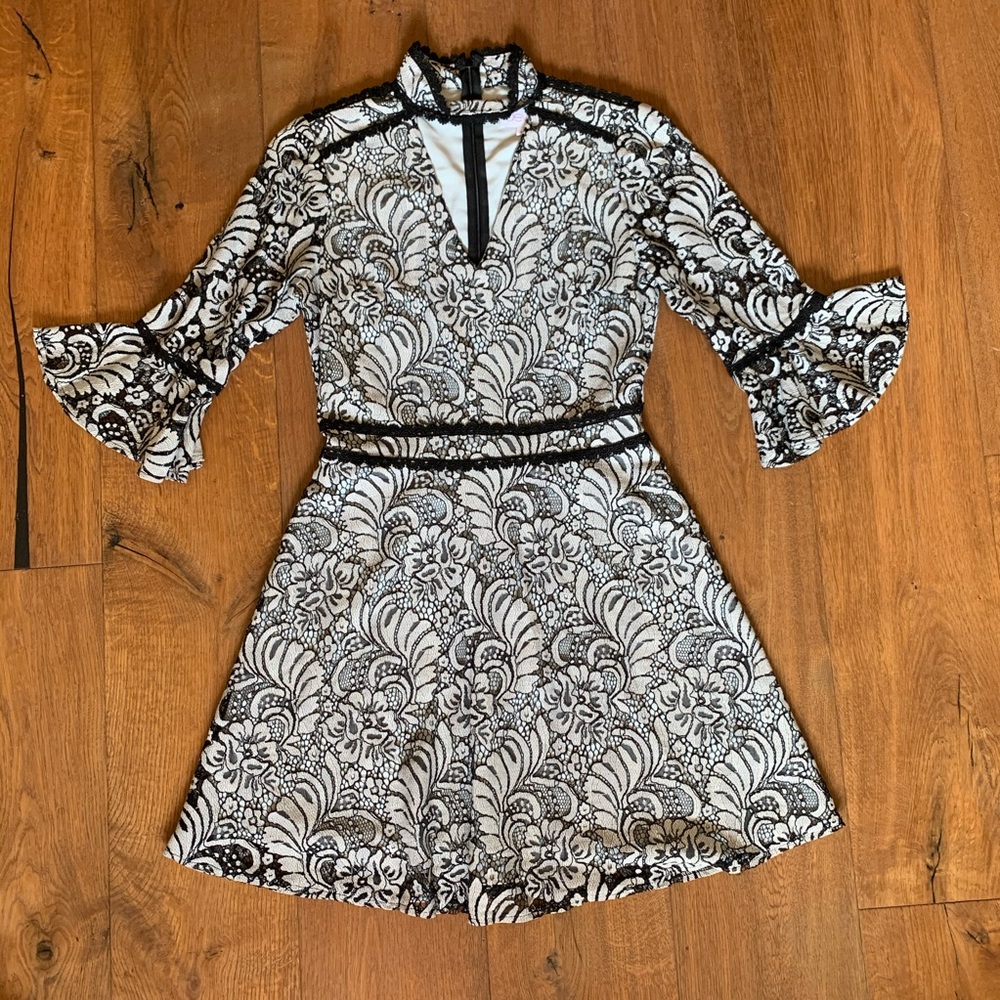 Black and gray lace dress with bell sleeve. New.